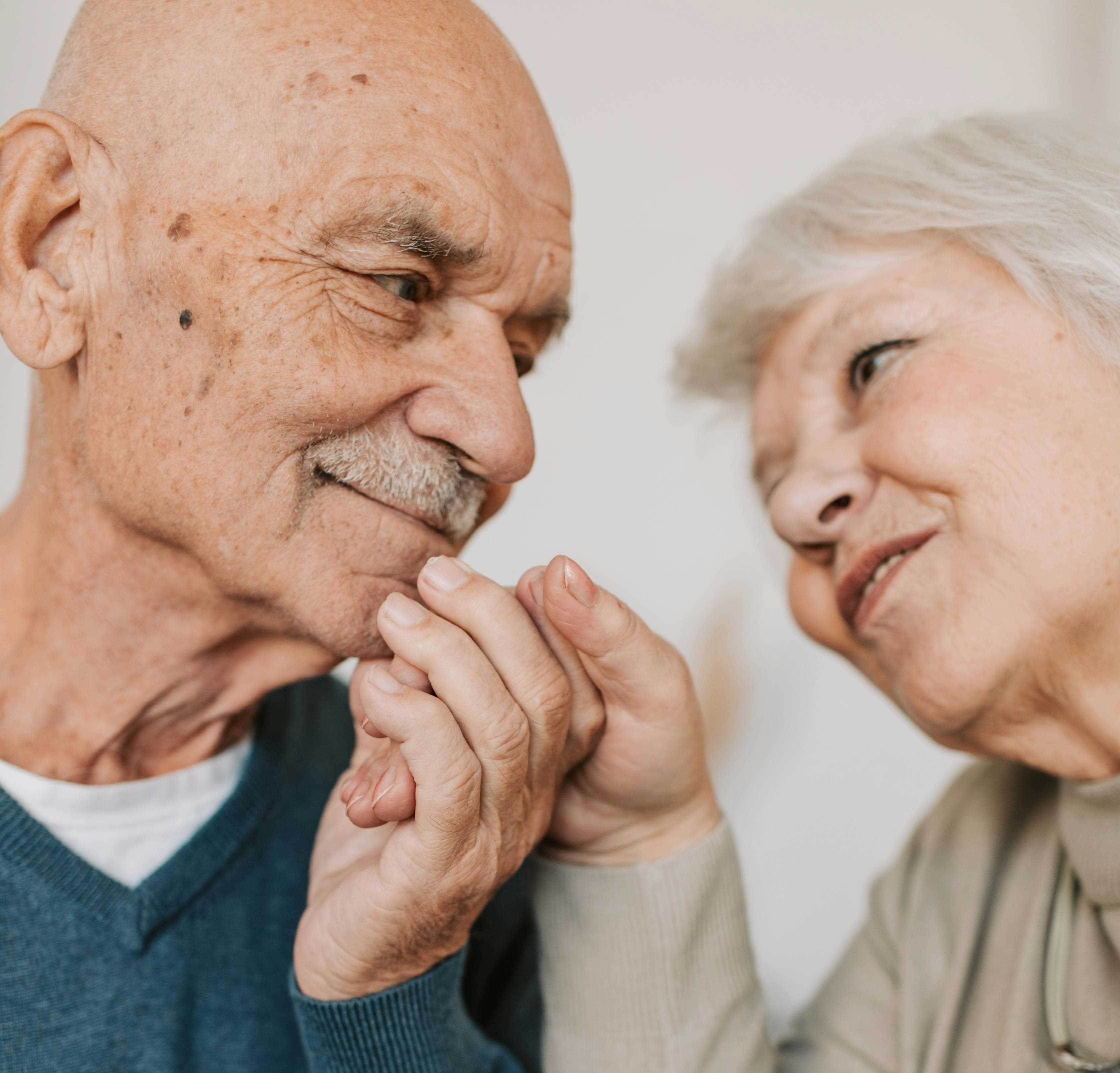 Happy senior couple eligible for plumbing discount