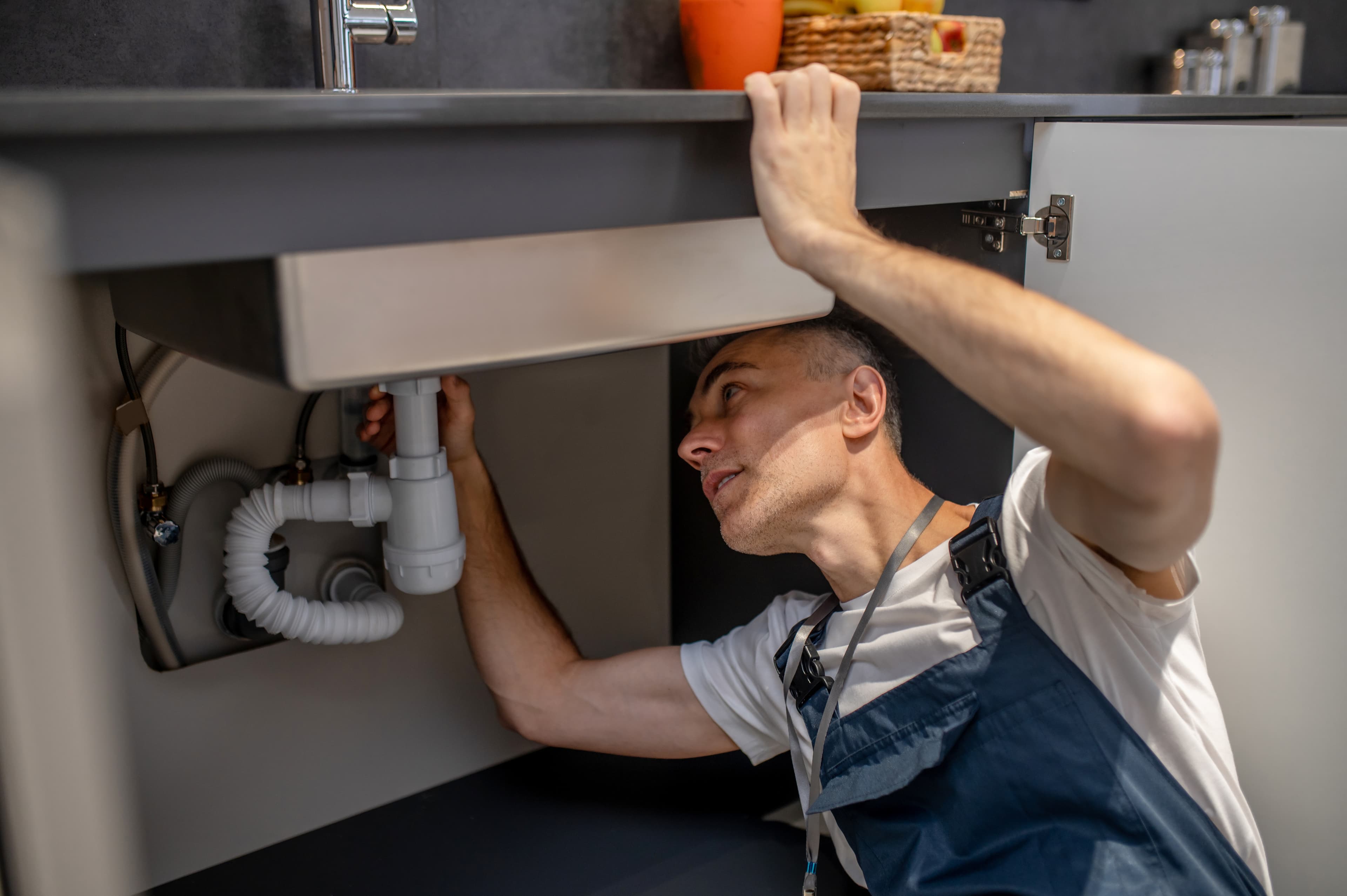 Plumber Fixing Pipe